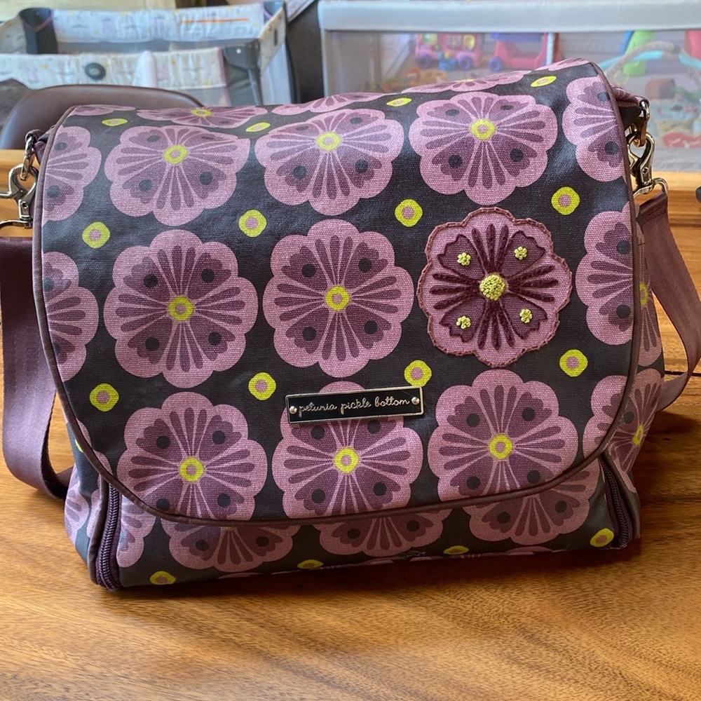 Petunia pickle bottom purple floral diaper bag.
